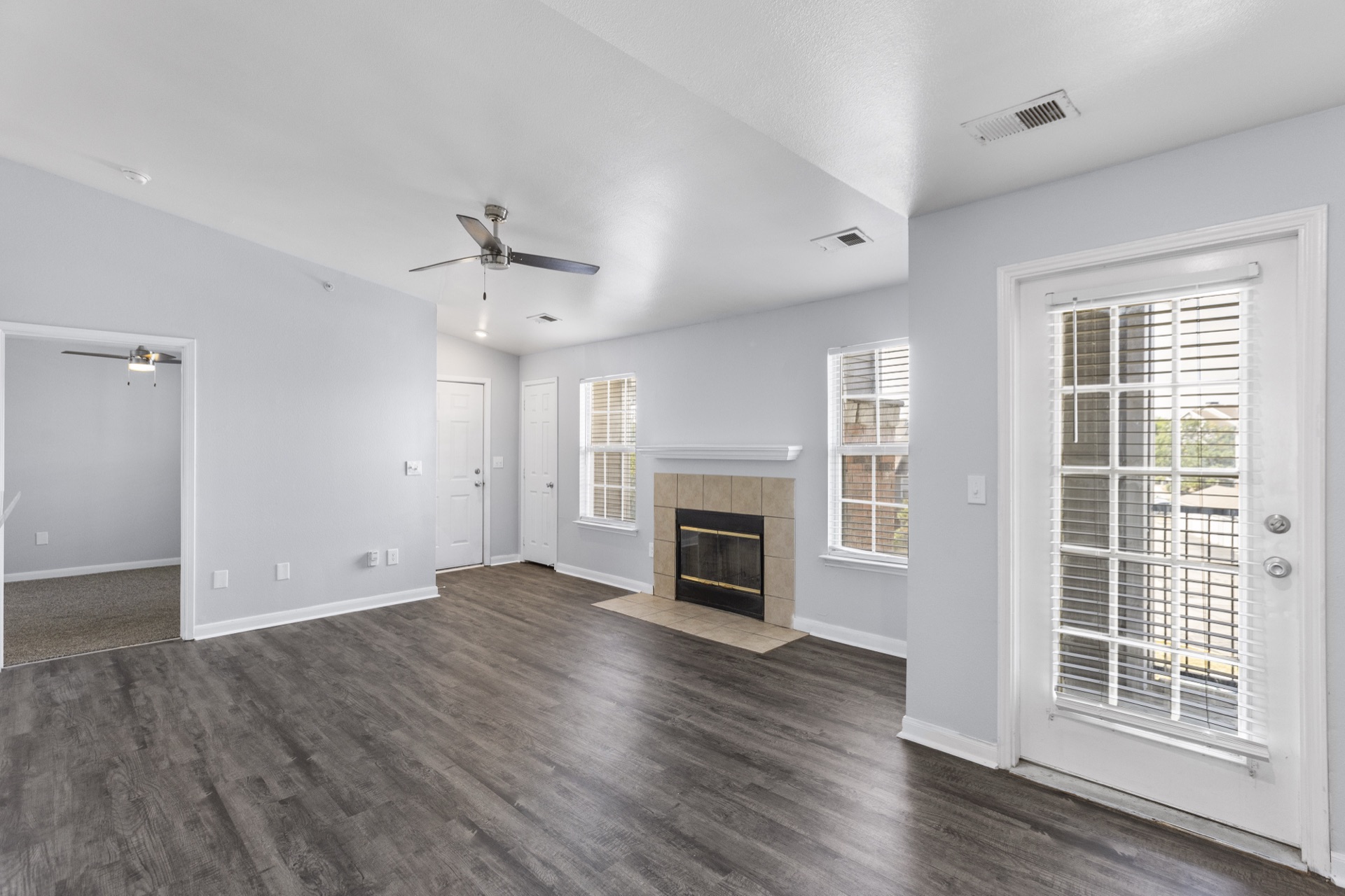The Villas @ North Oak — living room with fireplace